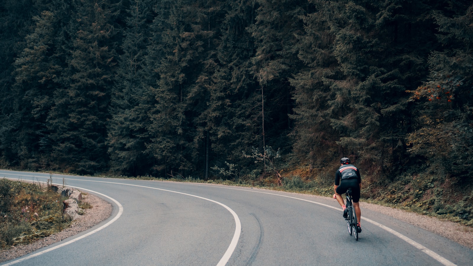Cyclist braking into a turn